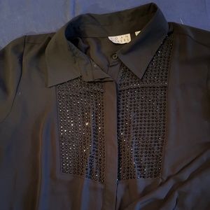 Beautiful black blouse more than ready for a party!